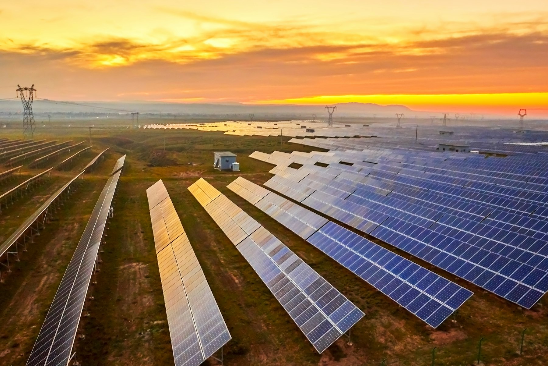 Image of solar panels and power lines