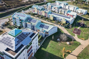 Modern Buildings With Solar Panels On The Roof Italy Shutterstock 2083613173