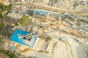 Aerial View Of A Building Construction Site With A Large Crane Shutterstock 2285931823