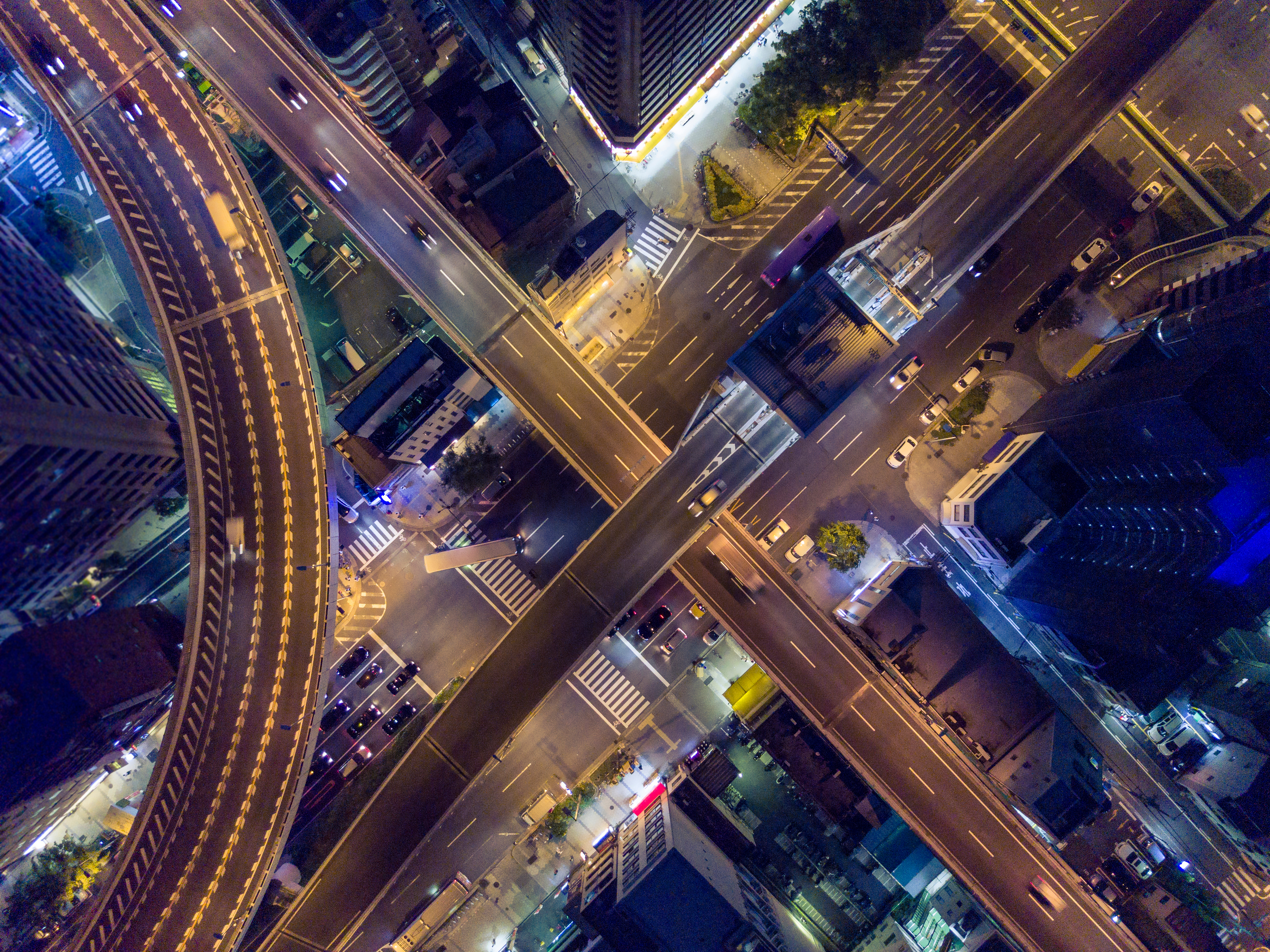 Nighttime aerial view of an intersection in Osaka Japan shutterstock 779959912