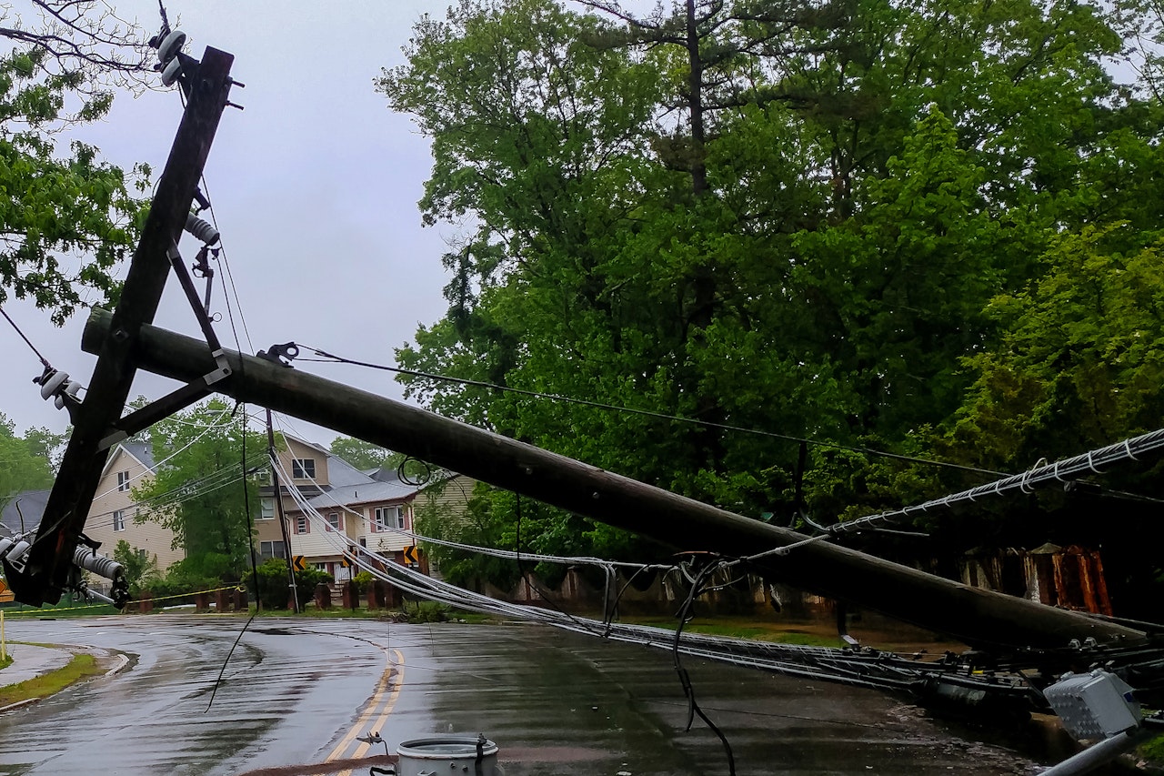 Cover Climate Resilience for Energy Security report_A photo of a power line knocked down in a street after a storm