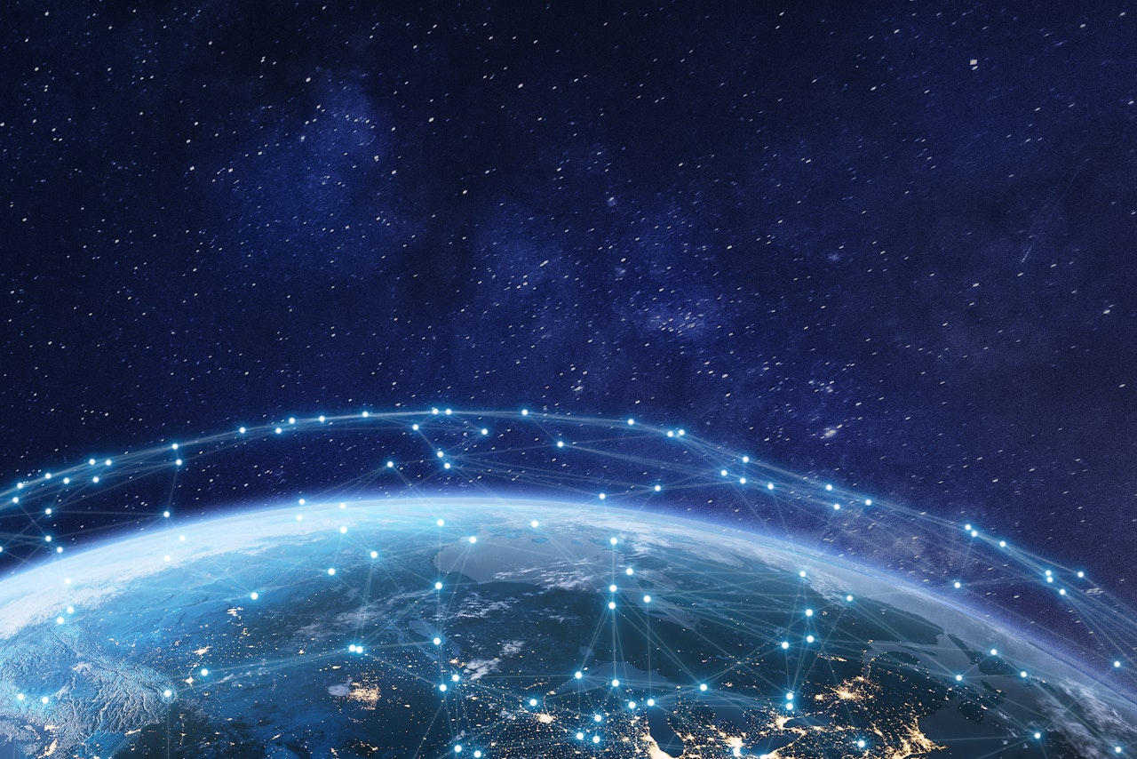 Photo depicts Telecommunications network over North America from space at night with city lights in the United States, Canada and Mexico, satellite orbiting Planet Earth for the Internet of Things IoT and blockchain technology