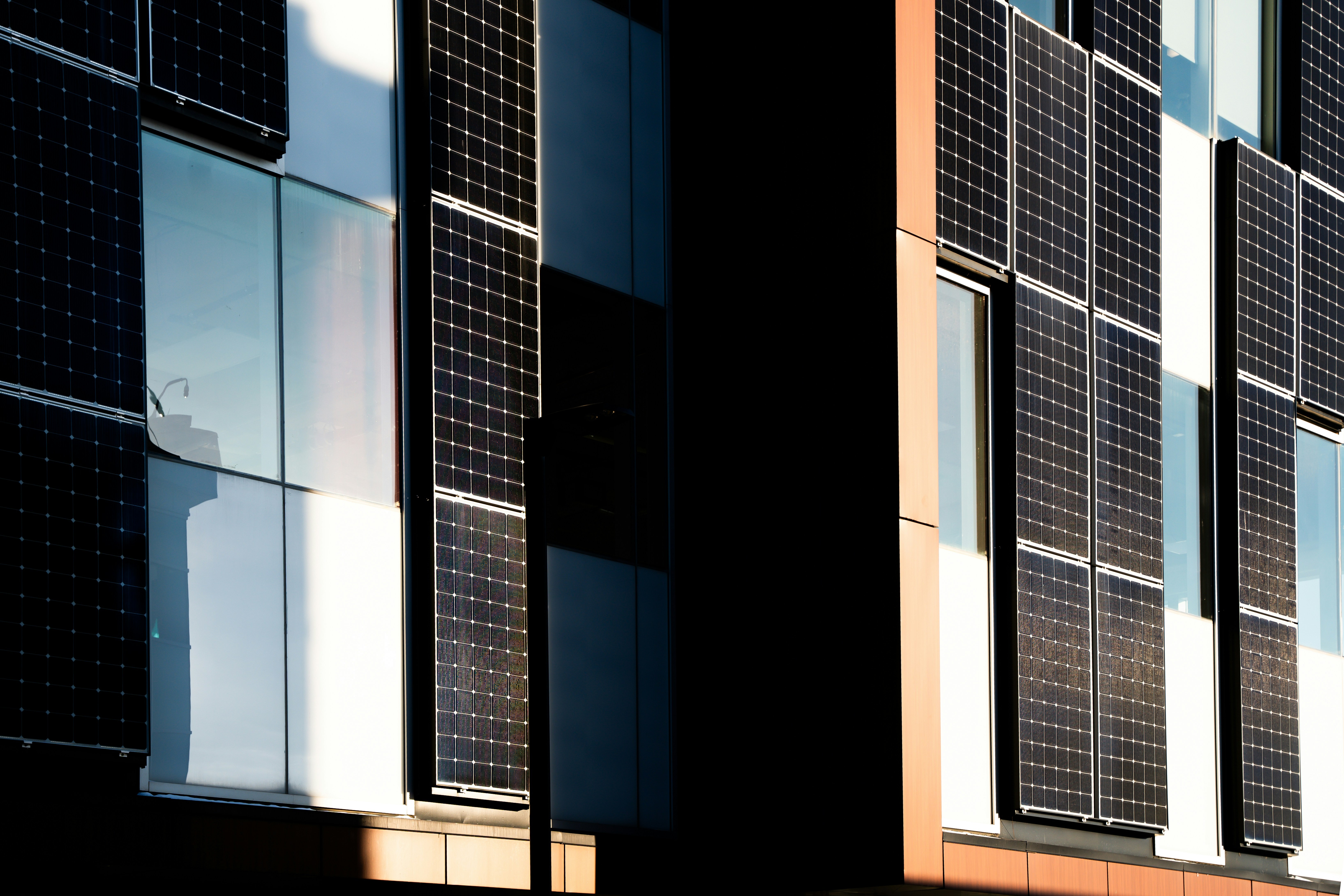 Modern building facade with integrated solar panels