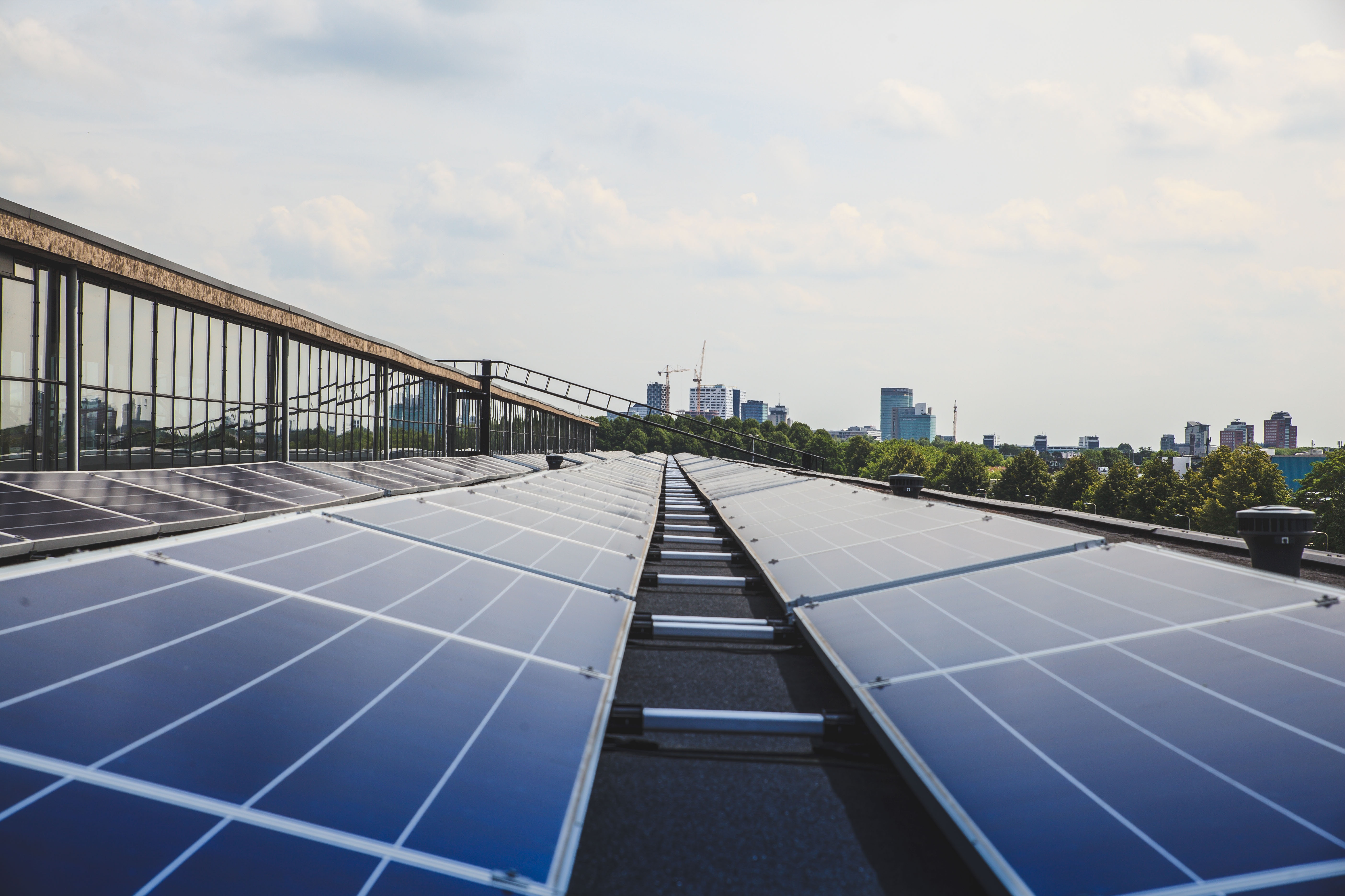 Cover Image Of Tripling Renewables Commentary Rooftop With Solar Panels