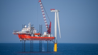 Offshore Wind Turbine in a Windfarm under construction off the English Coast, North Sea.