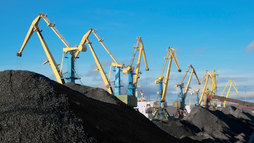 Photo Showing Portal Cranes Over Huge Heaps Of Coal In The Murmansk Commercial Seaport Russia Shutterstock 1978777190