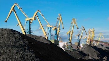 Photo Showing Portal Cranes Over Huge Heaps Of Coal In The Murmansk Commercial Seaport Russia Shutterstock 1978777190