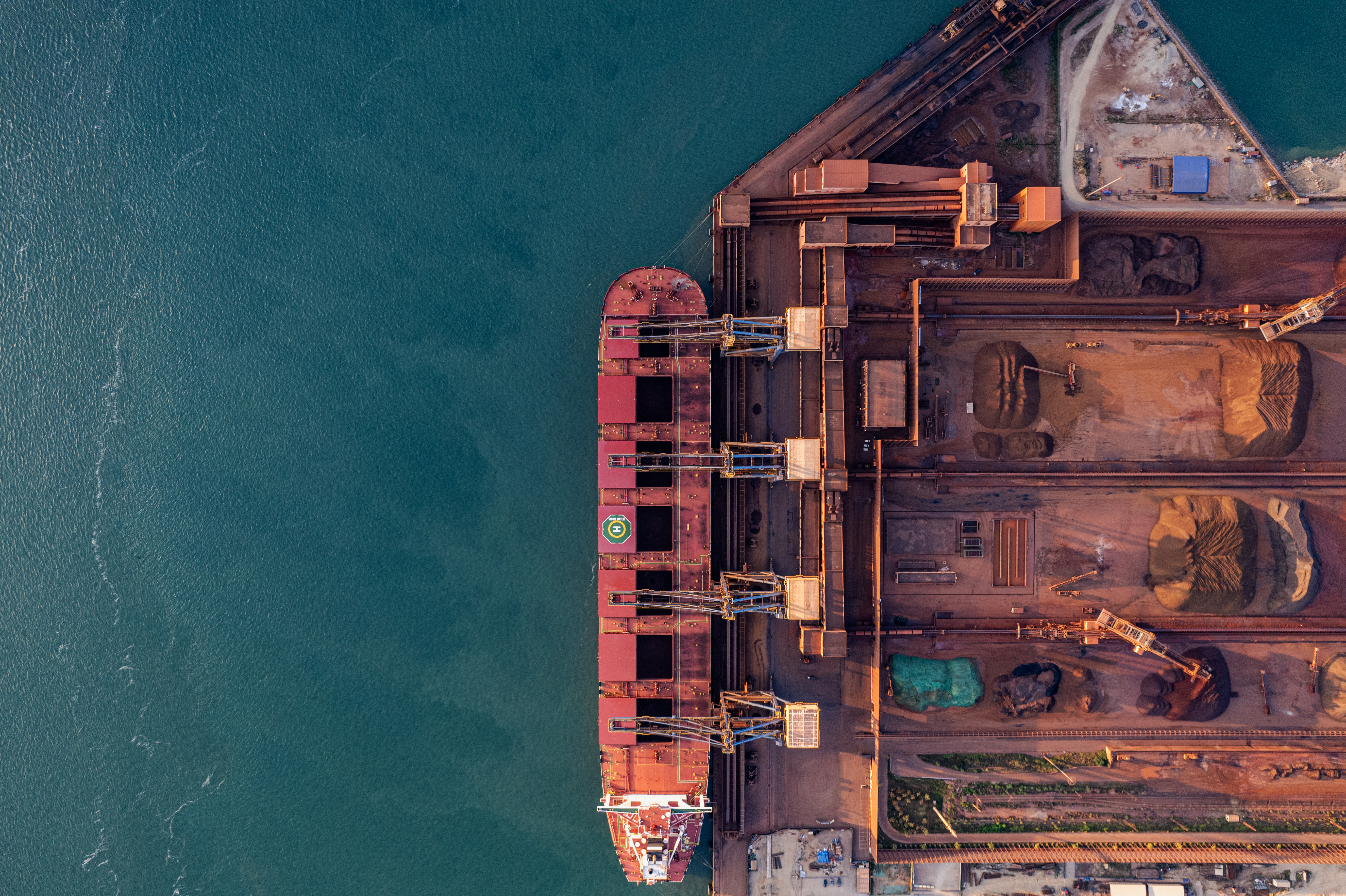 Aerial view of a cargo ship transporting critical minerals