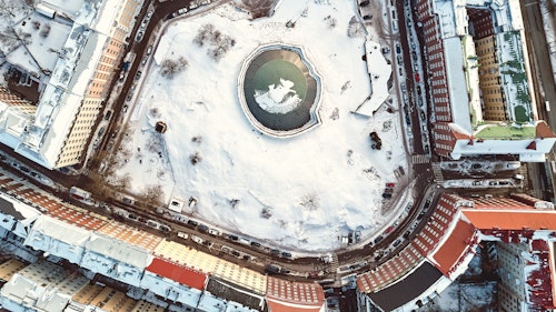 Aerial View Of Temppeliaukion Kirkko Under The Snow Helsinki Finland Aerial View Shutterstock 1042271983
