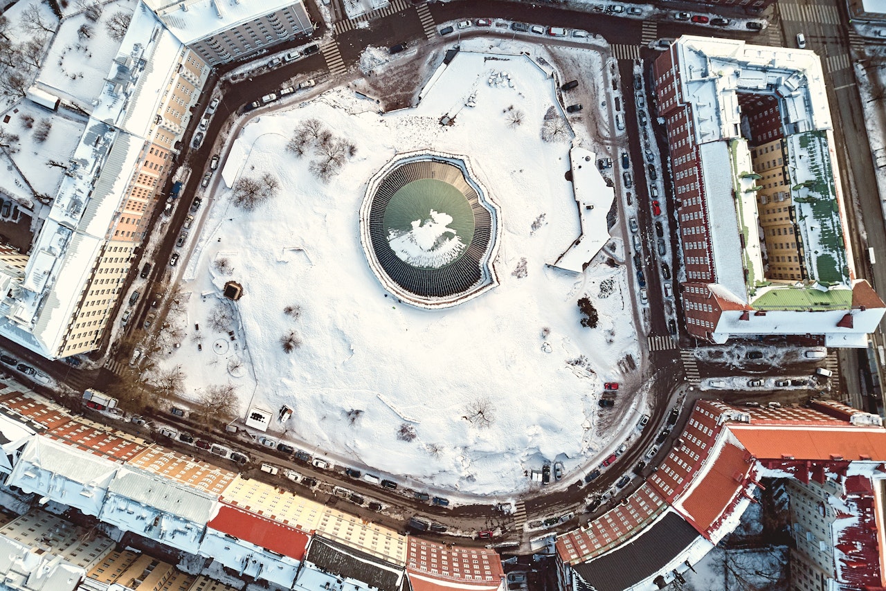 Aerial View Of Temppeliaukion Kirkko Under The Snow Helsinki Finland Aerial View Shutterstock 1042271983