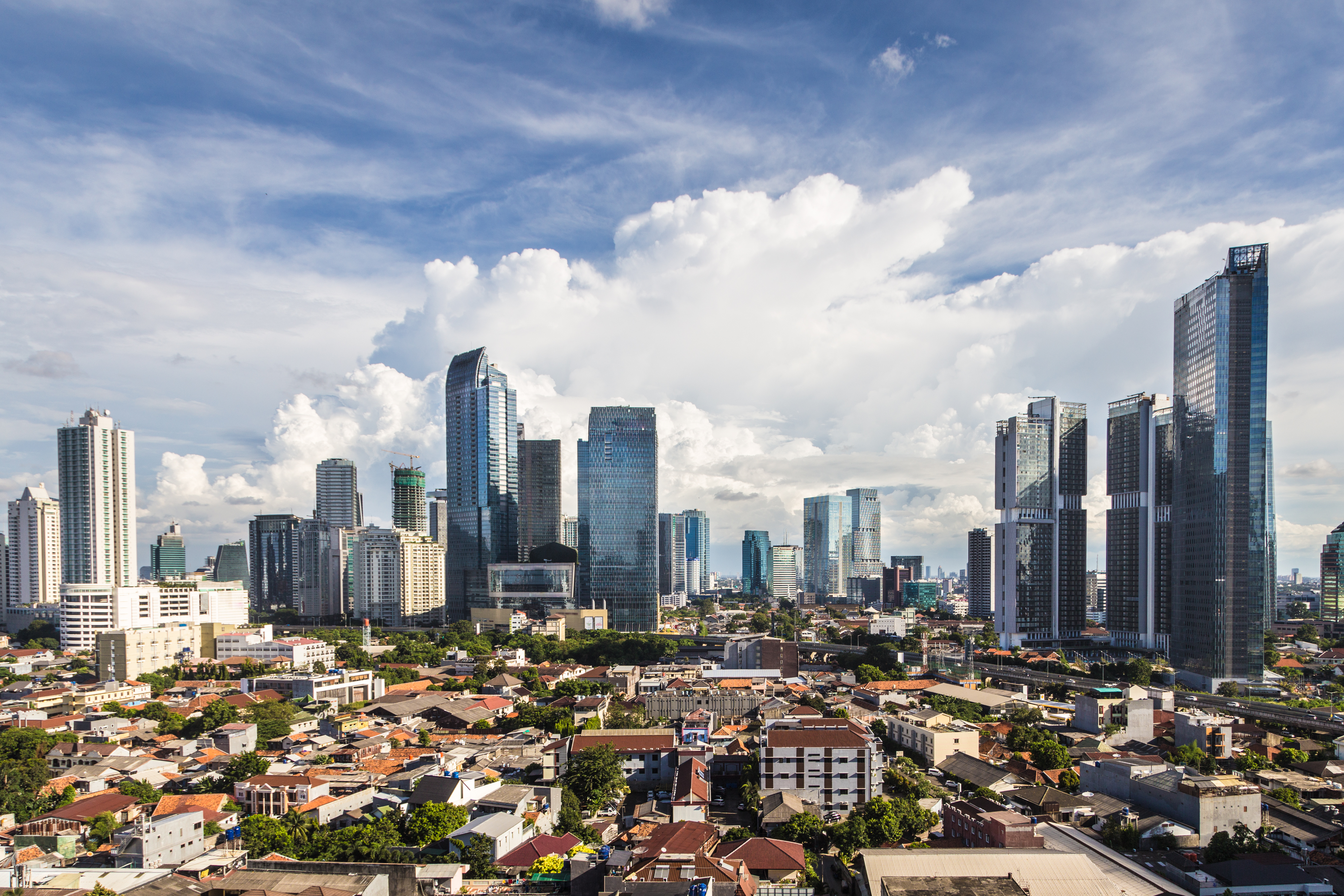 photo depicts Aerial view of office buildings in the South Central business district of Jakarta, the Indonesian capital.
