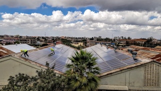 Photo depicts roof mounted solar power plant on a factory roof in Kenya in Africa