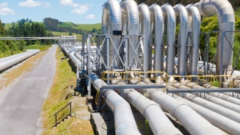 The photo depicts a pipeline installation for the distribution and supply of liquid and gaseous products, such as petroleum resources, over long distances