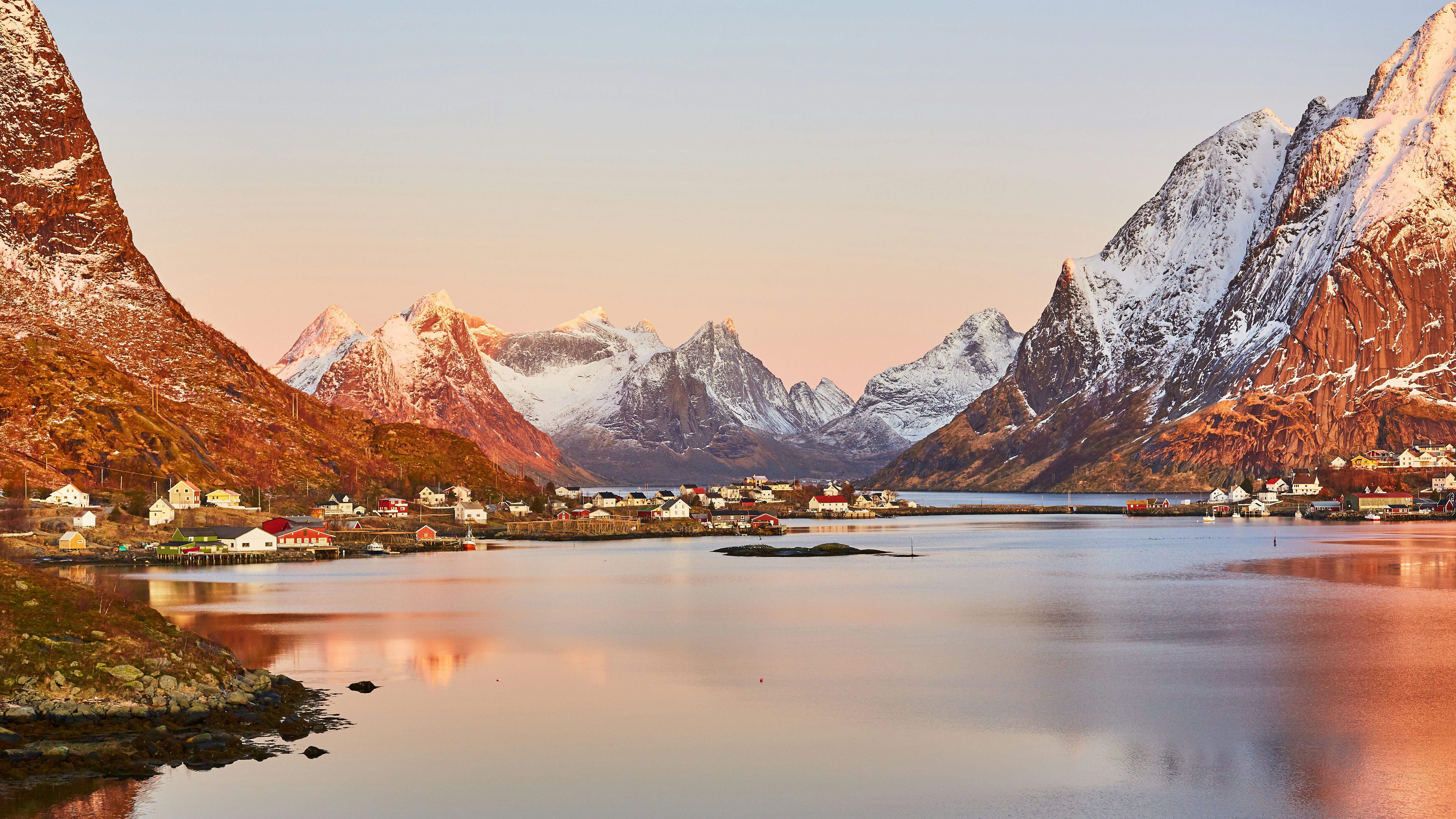 Photo of snow covered mountain near lake in daytime Lofoten Norway johny goerend d5pdKwxMjhE unsplash