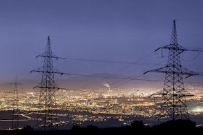 Photo depicts an High power electricity poles in urban area.