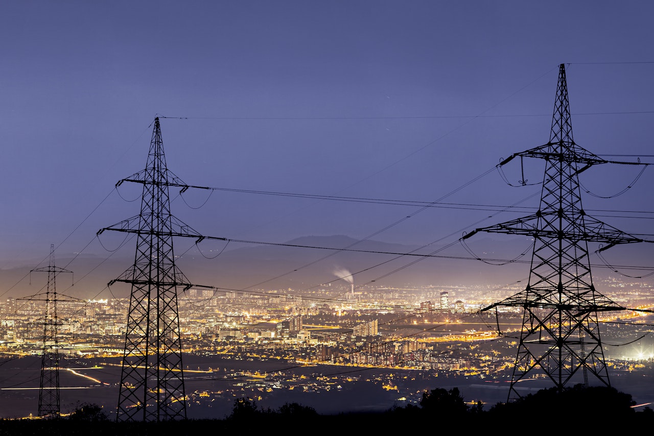 Photo depicts an High power electricity poles in urban area.